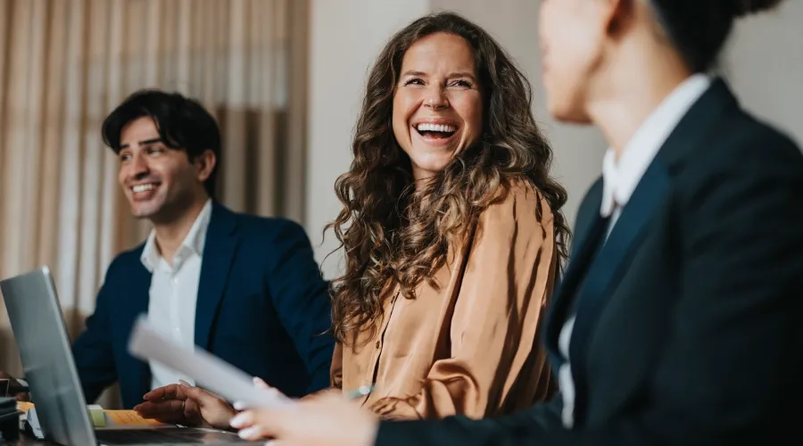 Smiling colleagues representing career opportunities at Alliance One.